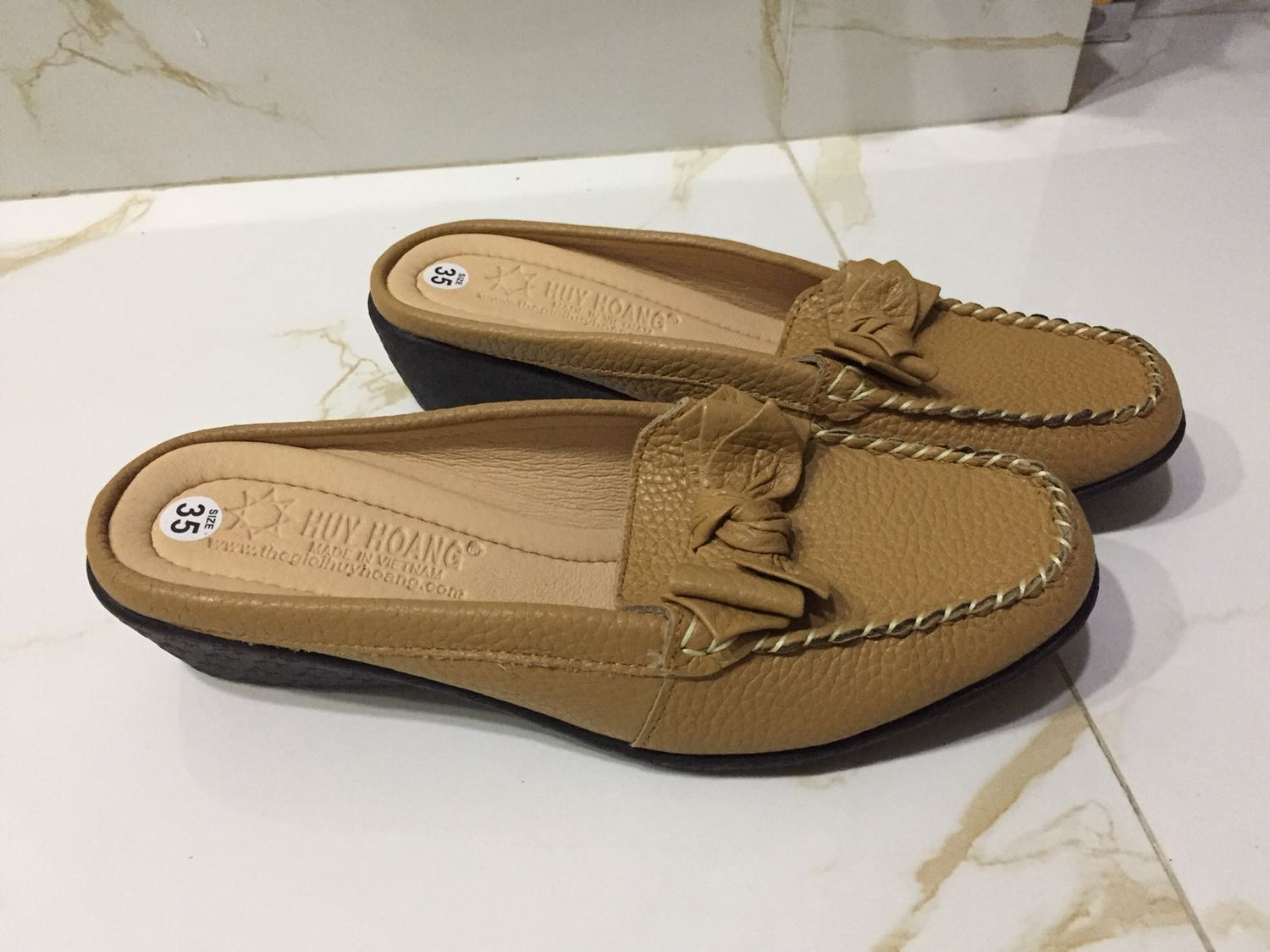 sản phẩm đẹp như hình, da mềm, đường may gọn đẹp, khá hài lòng!