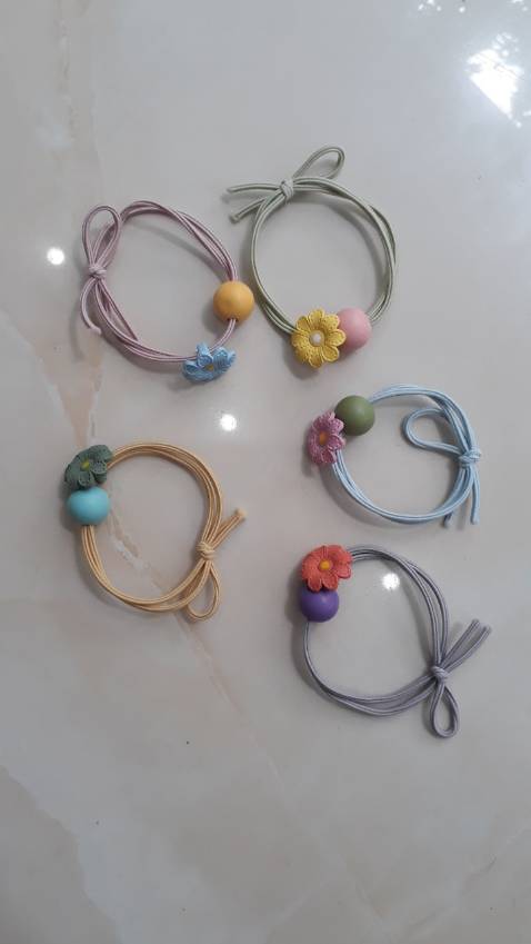 dây buộc tóc NASI đẹp lắm nha, giá rẻ, giao hàng nhanh, gói hàng cẩn thận. Tuyệt vời!