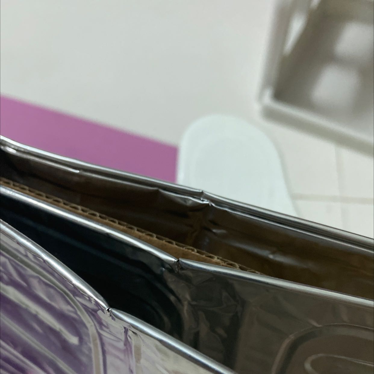 Đóng gói bị gãy mép, gấp đầu tấm chăn