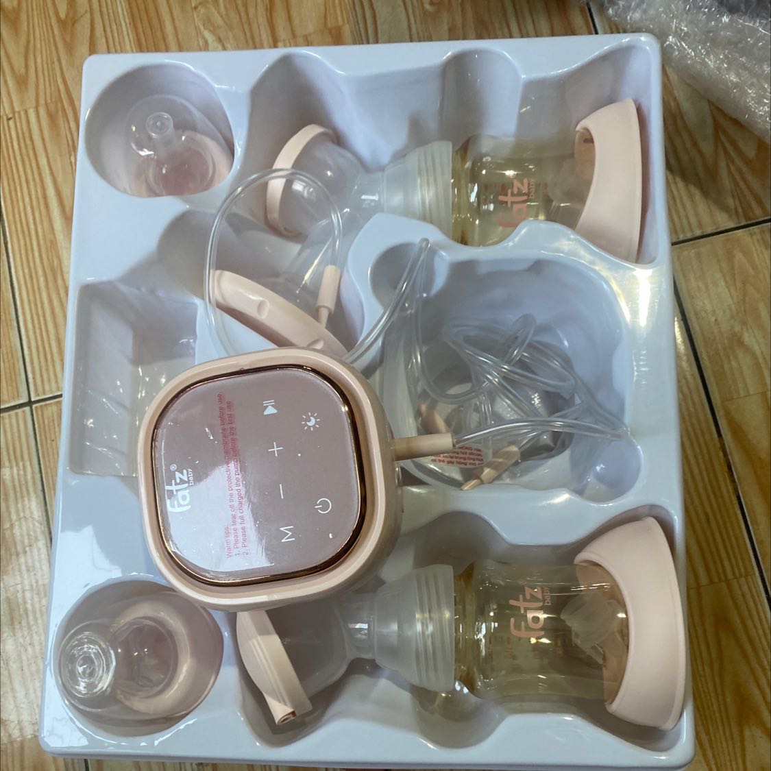 Máy hâm sữa chứ máy hút sữa đâu