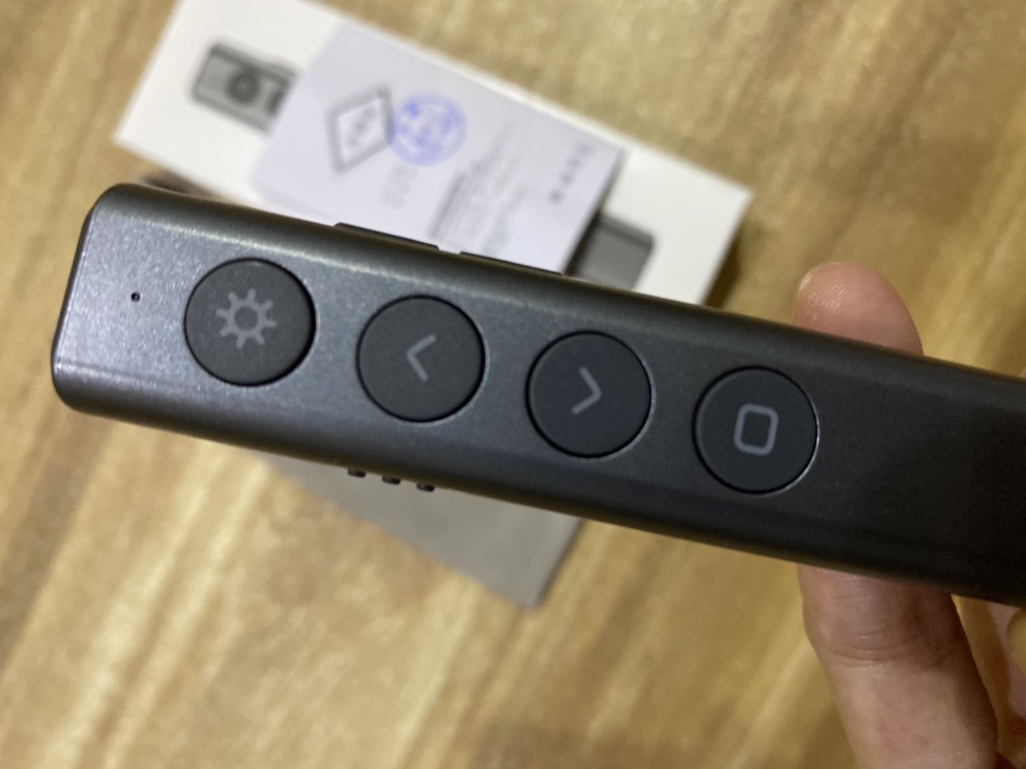 The item was received in about three days after purchase. The product doesn’t look as shiny as advertised, and it feels lighter than expected. Aesthetic aside, the item seems to be working well. Laser pointer function is very strong with a very long range. You must hold the button to maintain the laser. The rest of the buttons are use to control powerpoint. It comes with a storage bag and 1 AAA battery. The instruction booklet only comes in Chinese mandarin. So if you don’t know mandarin it will take a bit of time figuring out, it’s fairly easy to figure out. Or to save time you can visit Vson’s website. They have english instructions on there. The laser doesn’t seem to work on LG smart tv.