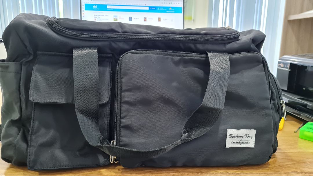 Túi đẹp, chống nước tốt, vải hơi mềm