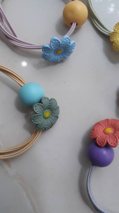 dây buộc tóc NASI đẹp lắm nha, giá rẻ, giao hàng nhanh, gói hàng cẩn thận. Tuyệt vời!