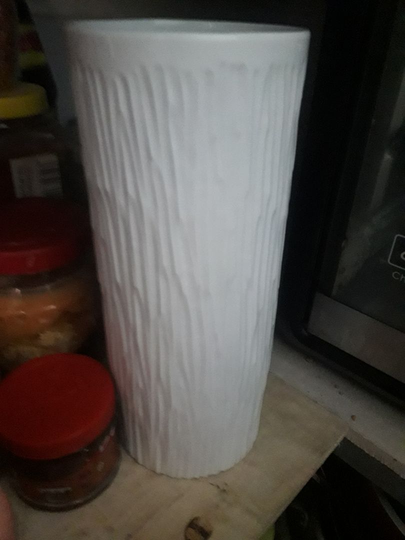 bình cao, đẹp, chắc chắn, rất đáng tiền, kiểu dáng lạ mắt, phù hợp trưng các loại hoa cao.