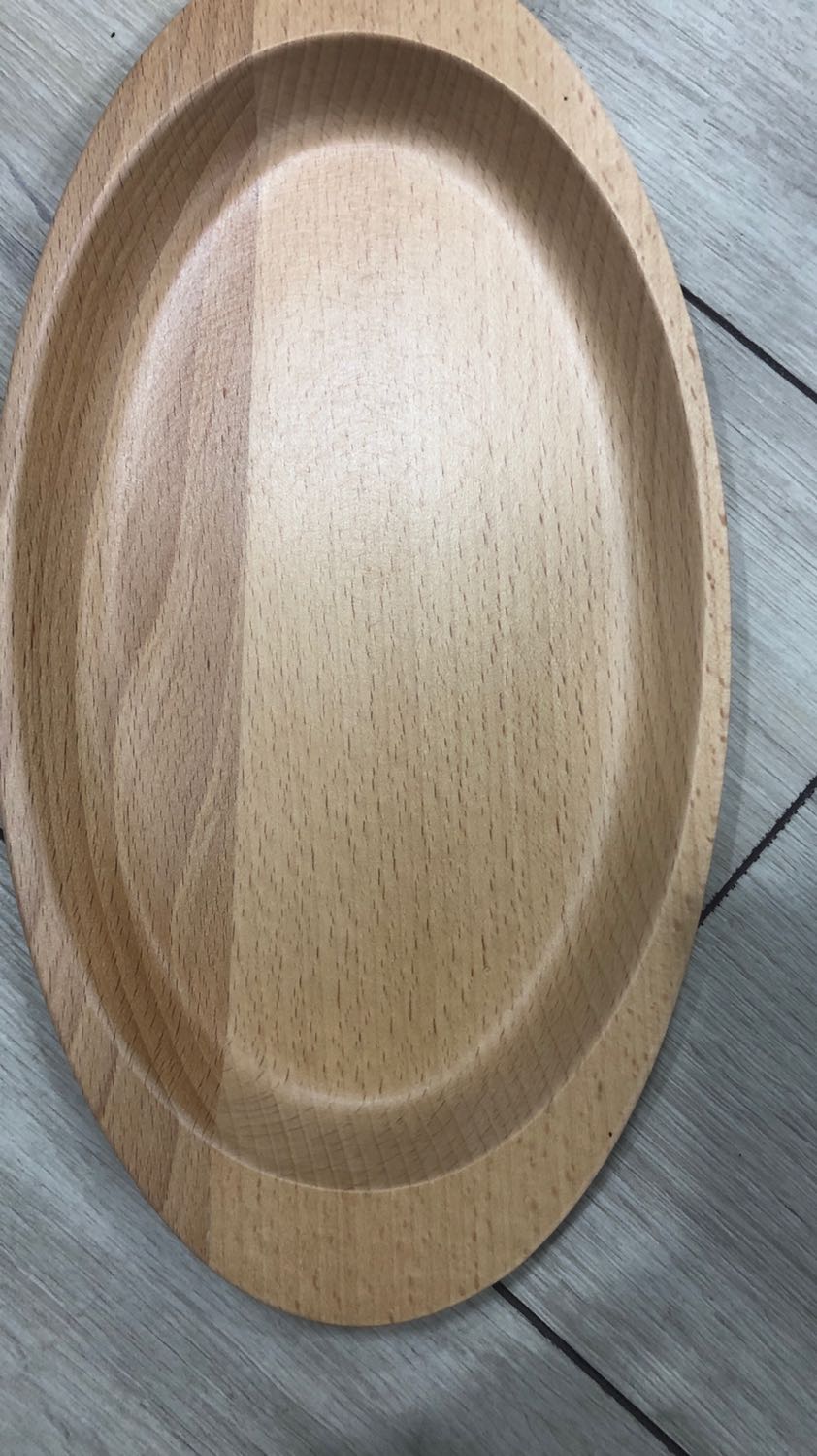 Sản phẩm làm bằng gỗ ghép , không nguyên miếng , nhìn kỹ còn thấy cả đường keo dán !