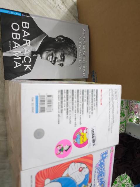 truyện đẹp, hông bị deformed, được tặng free cuốn a promised land, omg luôn ó