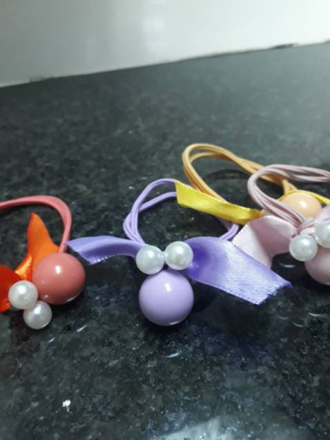 dây buộc tóc nasi mắt ếch dễ thương lắm ạ. Màu sắc rất đẹp. Quá rẻ. Rất hài lòng