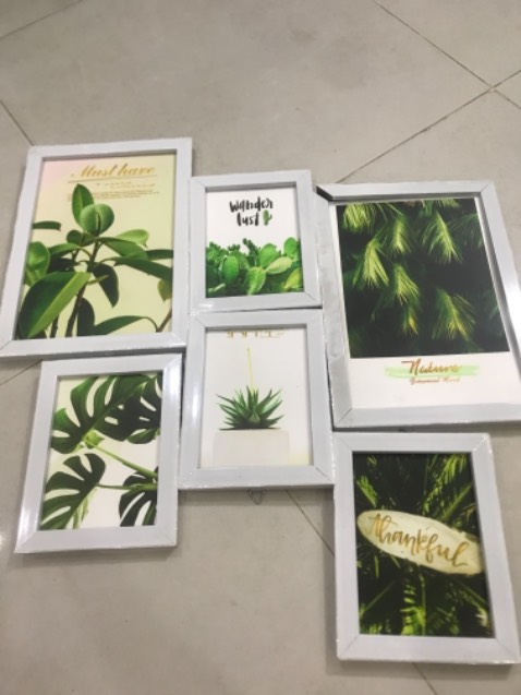 Giao sai hình.khung tranh thì vỡ nứt,bám bụi bẩn.thất vọng.