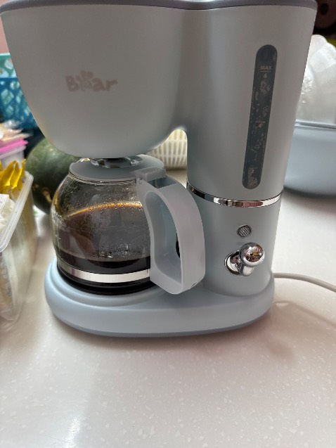 Đổ nước vào sau 15giây là có cà phê, không biết nước có sôi nóng không, cà phê ấm không nóng