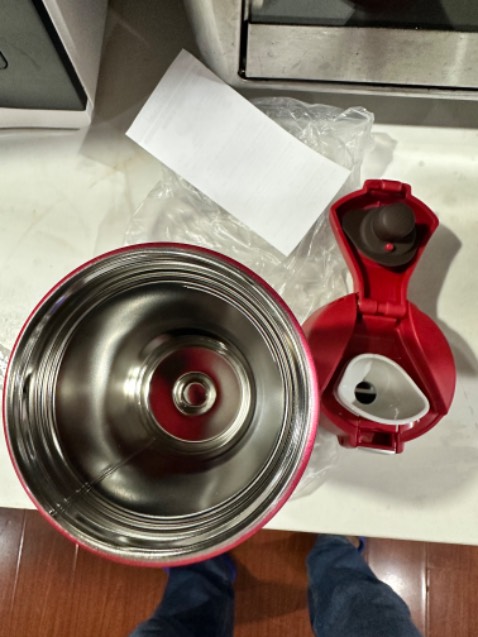 Đặt mua bình vỏ màu inox nguyên bản, shop lại giao màu đỏ.