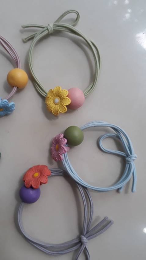 dây buộc tóc NASI đẹp lắm nha, giá rẻ, giao hàng nhanh, gói hàng cẩn thận. Tuyệt vời!