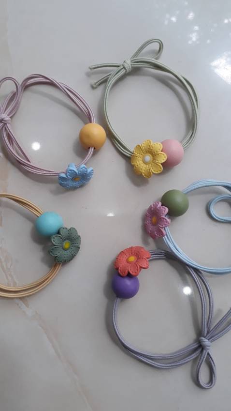 dây buộc tóc NASI đẹp lắm nha, giá rẻ, giao hàng nhanh, gói hàng cẩn thận. Tuyệt vời!