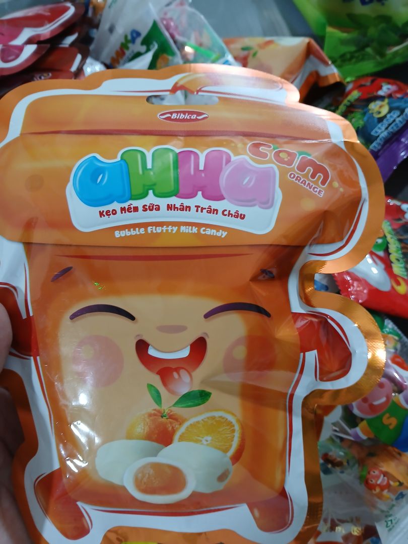 nên đổi cái bao bì sản phẩm vị cam, nhìn tục quá