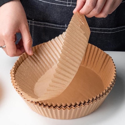 Ok giấy lót nồi chiên không dầu. Sản phẩm chịu nhiệt độ cao. Dùng để nướng bánh , quay, rán.