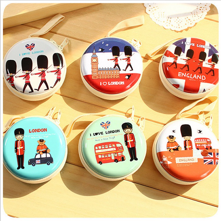 Combo 2 hộp thiếc tròn mini hoạt hình đựng tiền, tai nghe, cáp sạc - họa tiết ngẫu nhiên