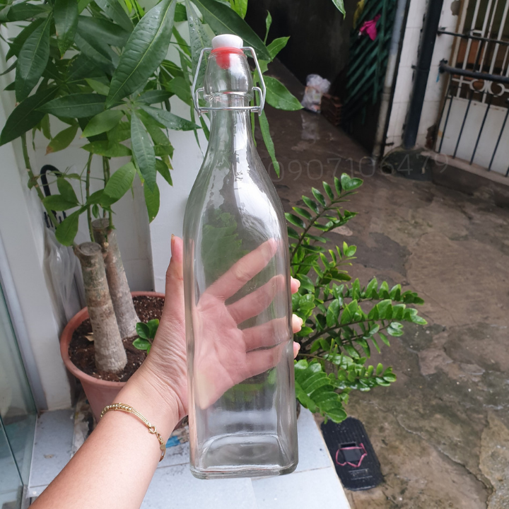 Chai thủy tinh nắp gài kín hơi 1 lít đáy vuông