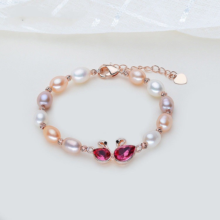 Combo lắc tay Thiên Nga nữ, chất liệu Ngọc Trai thật, cấu trúc vân tay, Màu Trắng Ngà, hạt bầu dục 6li, kèm Giấy kiểm định sản phẩm mẫu tại SJC, Kèm hộp đựng Hoa Hồng – Mẫu Luxi green – CownX.05