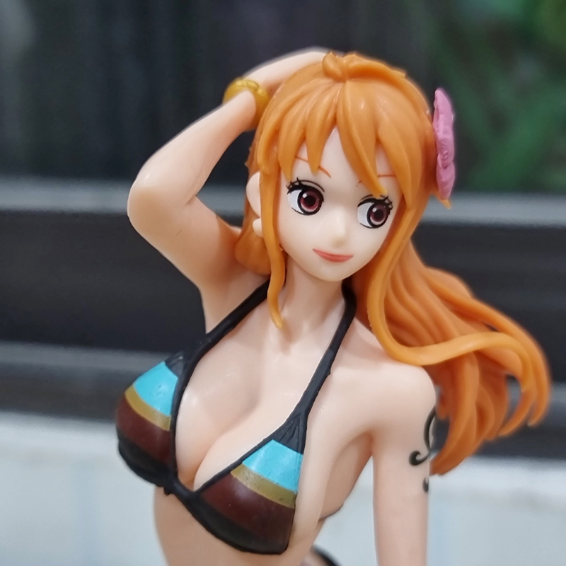 Chào mừng đến với thế giới Mô hình One Piece, Nami, Bikini! Bạn sẽ thấy một màn trình diễn tuyệt vời, một sự kết hợp giữa vẻ đẹp của Nami và vẻ sexy của bikini.