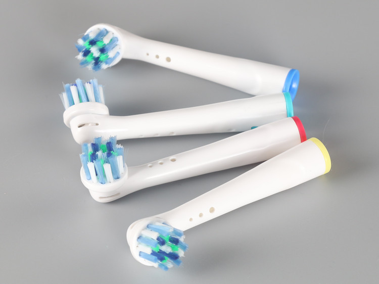 bộ 4 đầu bàn chải đánh răng điện cho mọi loại máy braun oral b làm sạch kẽ răng, răng nhiều mảng bám - xuất xứ anh 44