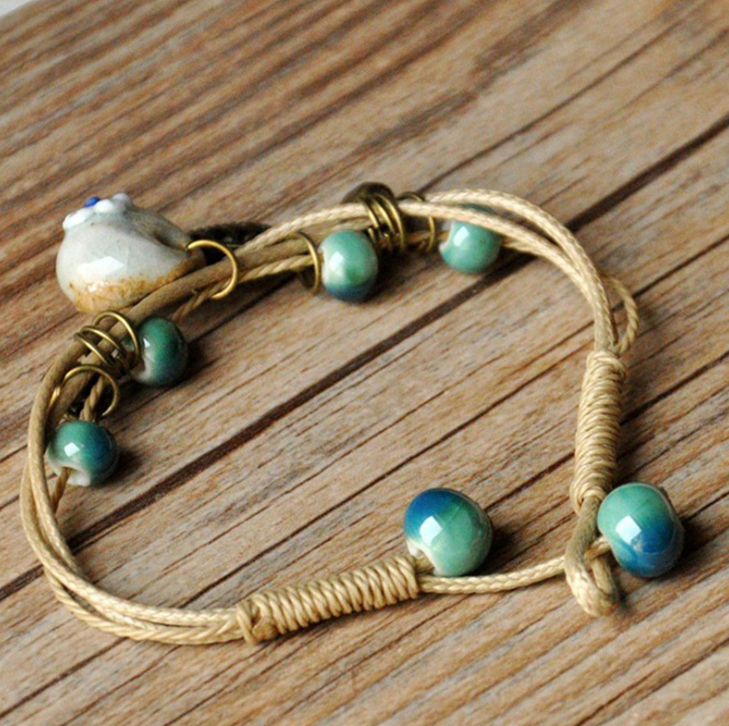 Vòng tay gốm hạt truyền thống giỏ hoa VGOM46