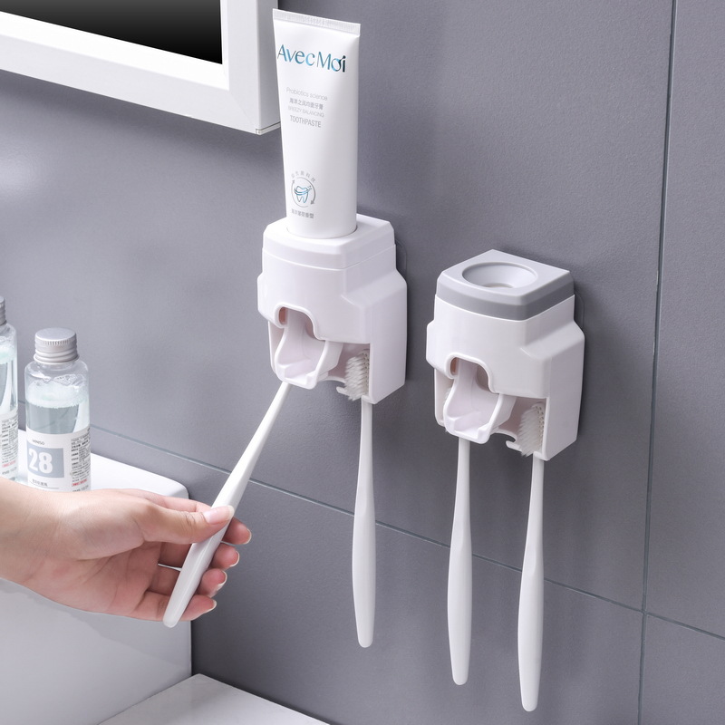Dụng cụ nặn kem đánh răng tự động có giá treo bàn chải dán tường NAVIVU