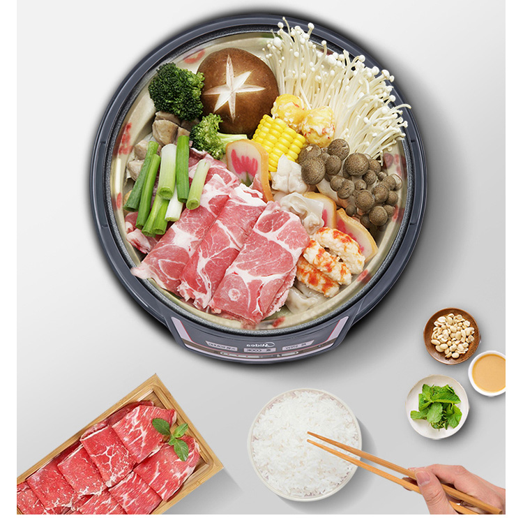 Midea multi-purpose pot household electric hot pot electric skillet electric cooker electric wok HS136B can be fried and split design
