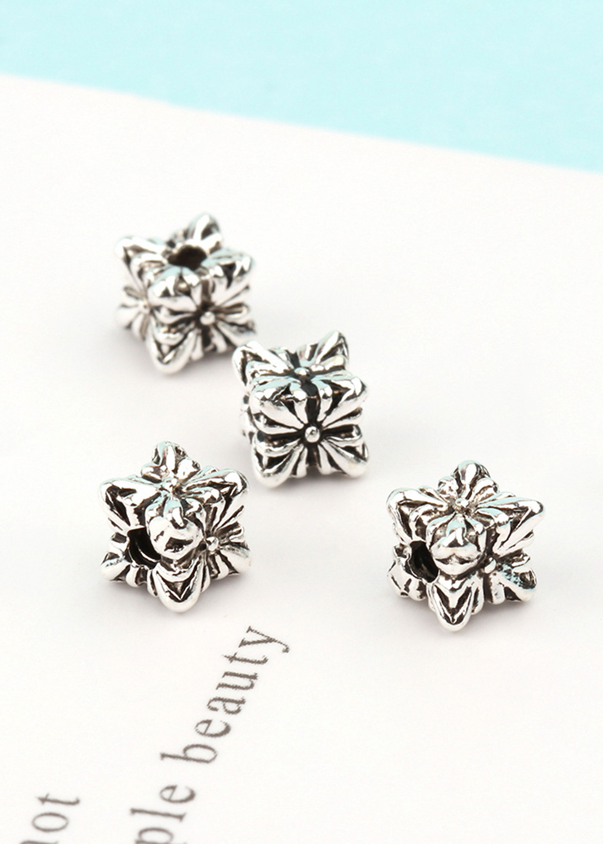 Combo 4 cái charm bạc chặn hình hoa - Ngọc Quý Gemstones