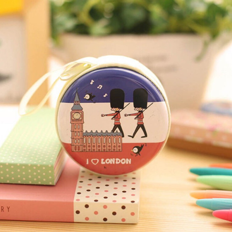 Combo 2 hộp thiếc tròn mini hoạt hình đựng tiền, tai nghe, cáp sạc - họa tiết ngẫu nhiên