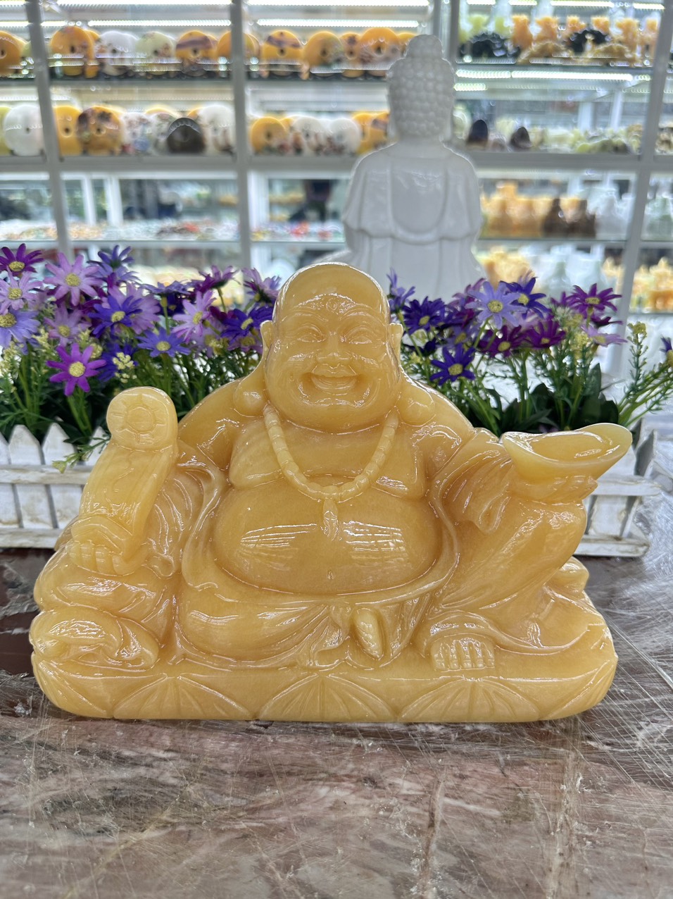 Tượng Phật Di Lặc ngồi tựa bao tiền cầm thỏi vàng phong thủy đá ...