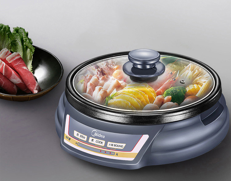 Midea multi-purpose pot household electric hot pot electric skillet electric cooker electric wok HS136B can be fried and split design