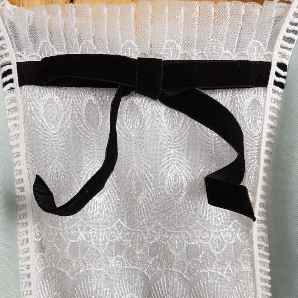 Đầm thiết kế cổ vuông ren nơ tay bồng màu xanh bạc hà